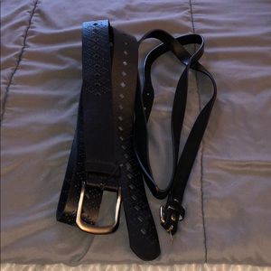 Two black size 3 belts